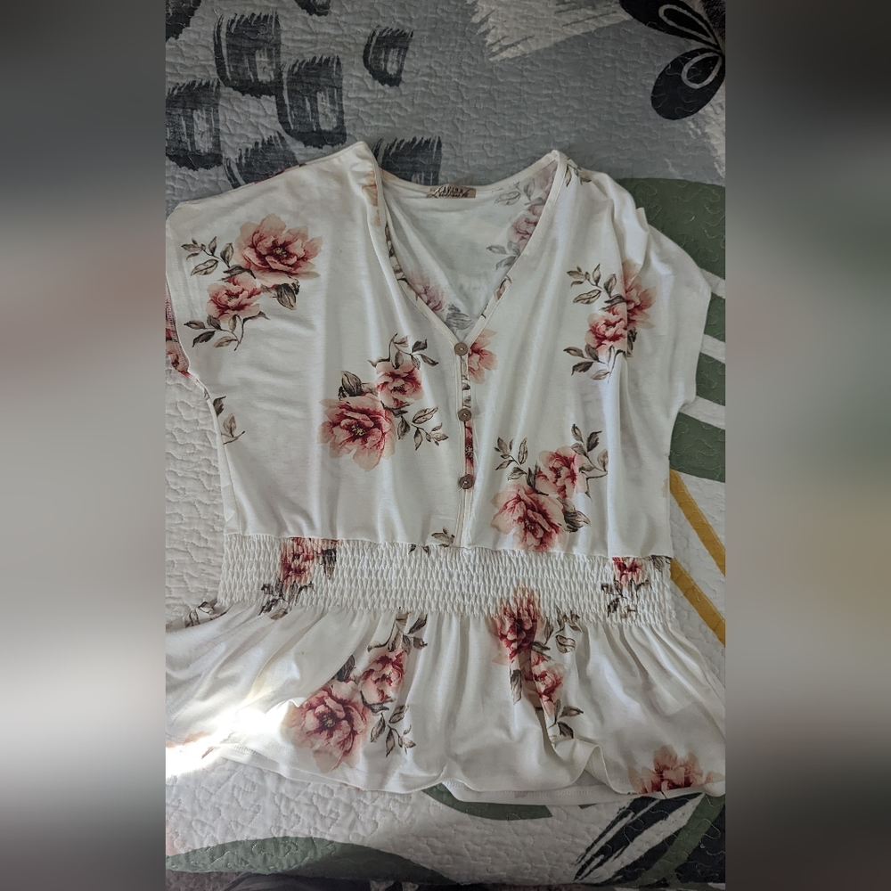 White blouse with flower pattern